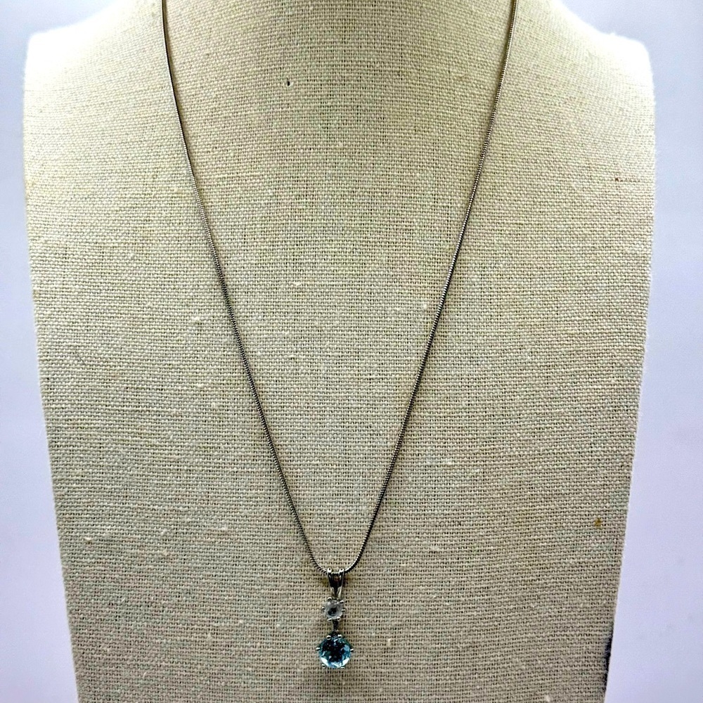 Elegant Silver Tone Necklace with Blue Topaz Pendant